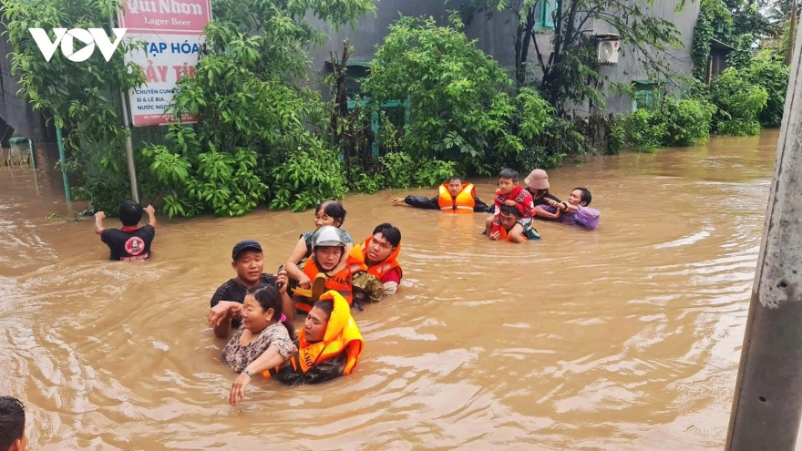 Soldiers battle raging floods, race against time to save lives in Central Vietnam